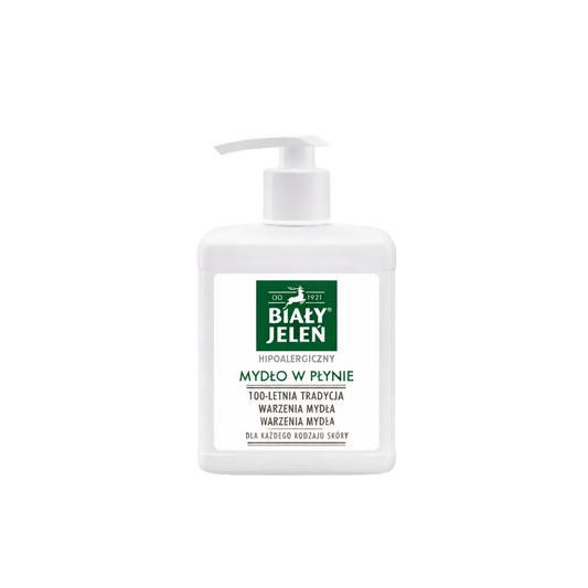 White bottle of liquid soap with a pump on a white background