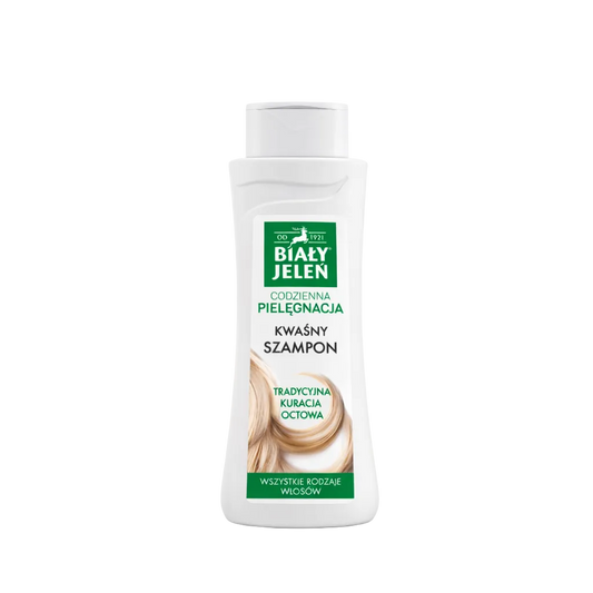 Bottle of Bialy Jelen shampoo on a white background